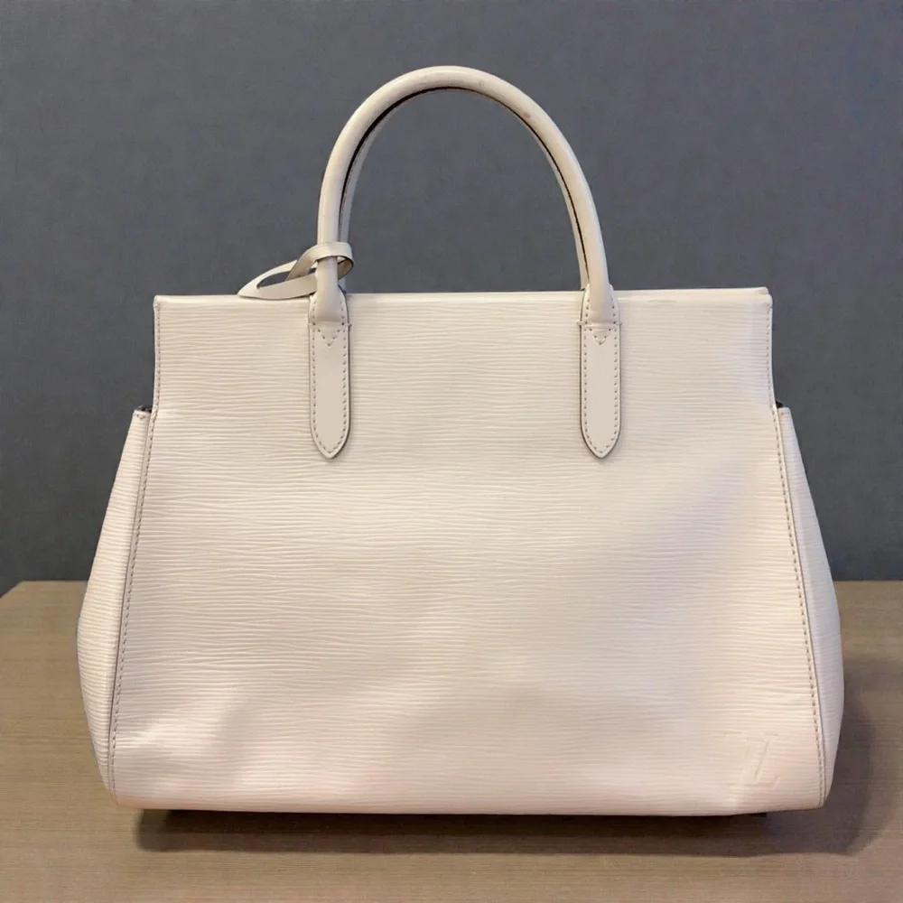 Authentic pre-loved Louis Vuitton Marly MM bag in Epi leather in color DUNE - Picture 1 of 12
